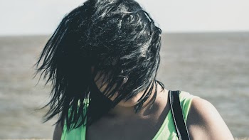 Woman Covered Her Face With Hair