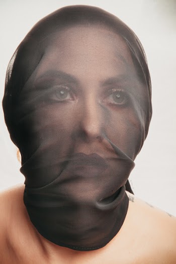 Woman Covering Black Mesh Mask