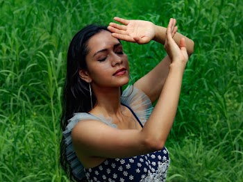 Woman Covering Her Face