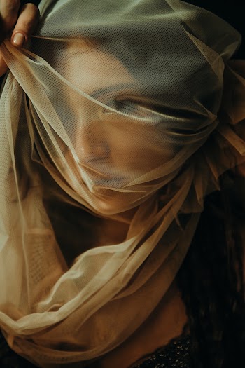 Woman Covering Her Face