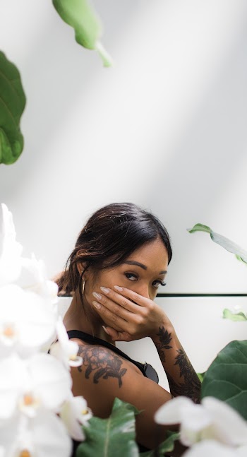 Woman Covering Her Face