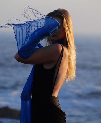 Woman Covering Her Face Using Scarf