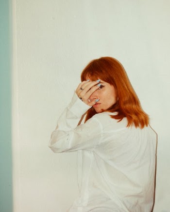 Woman Covering Her Face with Her Hands · Free Stock Photo