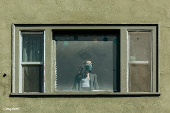 Woman covering her mouth with a bandana staring out the window during .. | Free  photo - 2328916