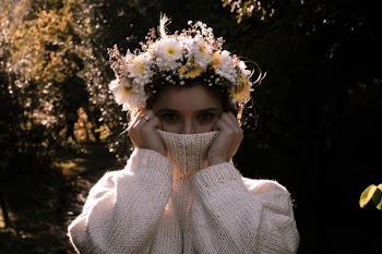 Woman Covering Her Mouth With Her Neckline