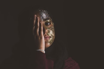 Woman Covering Her Right Eye
