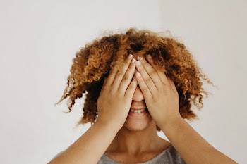 Woman Covering His Eyes