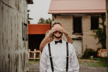 Woman Covering Man's Eyes