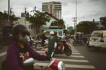 woman crossing at the pedestrian lane