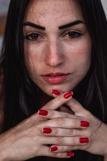 Woman Crossing Her Fingers