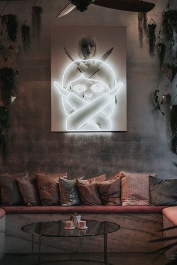 woman crossing her hands neon light signage