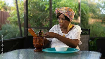 Woman cutting vegetables and preparing dinner