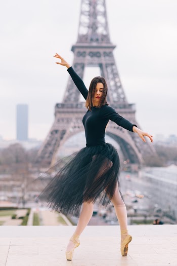 Woman Dancing Ballet In Front Of Eiffel Tower