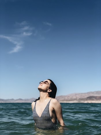 Woman Dipped in the Beach