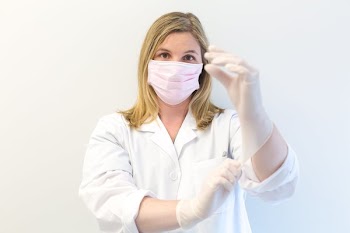 Woman Doctor With Gloves