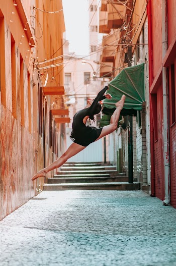 Woman Doing Ballet Dance in Pathway
