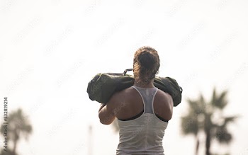 Woman Doing Crossfit Workout in Park