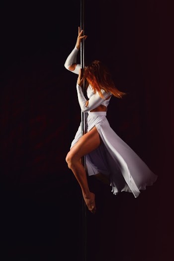 Woman Doing Pole Dance