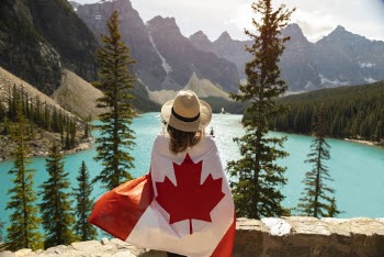 Woman Draped In A Flag Of Canada