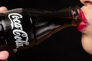 Woman Drinking 237 Ml. Coca-cola