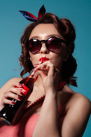 Woman Drinking Coca-cola