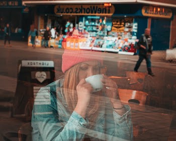 Woman Drinking Cup of Coffee 