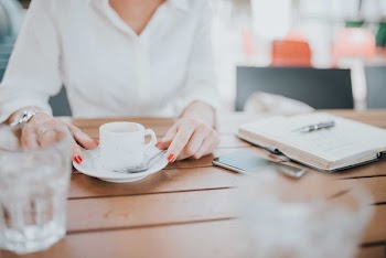 Woman Drinking Espresso Coffee