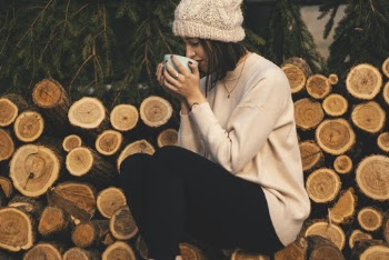 Woman Drinking from Cup