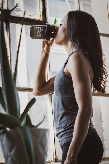Woman Drinking on Tumbler