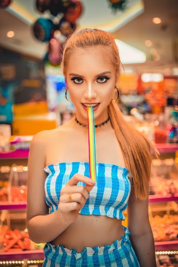 Woman Eating Candy