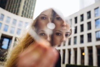 woman face reflection on mirror