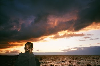 Woman Facing Body of Water