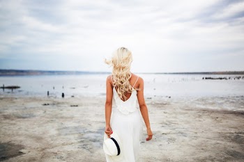 Woman Facing Body of Water