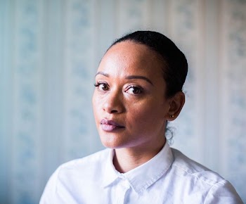 woman facing sideways in shallow focus lens