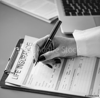 Woman filling life insurance form