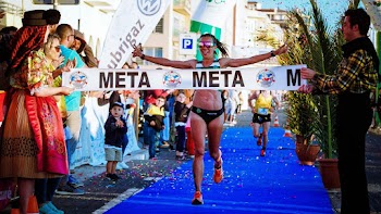 Woman Finish the Line on Going Marathon