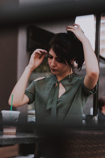 Woman Fixing Hair