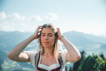 Woman Fixing Her Hair