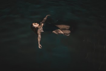Woman Floating on Water