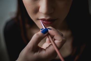 Woman Getting Lip Makeup