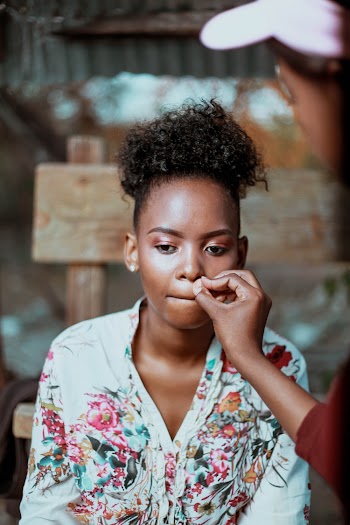 Woman Getting Make-up Done