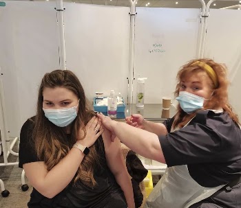 Woman getting vaccine, December 15, | Free Photo - rawpixel