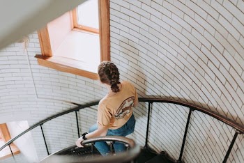 woman going downstairs