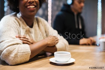 Woman having a coffee at a cafe