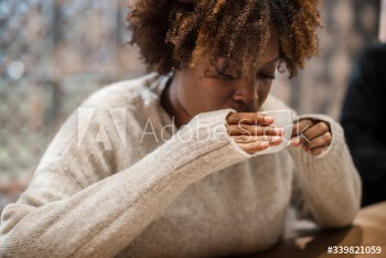 Woman having a coffee at a cafe