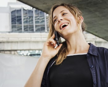 Woman Having Call Conversation on Smartphone