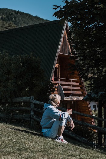 Woman Having Coffee Drink Outside The House