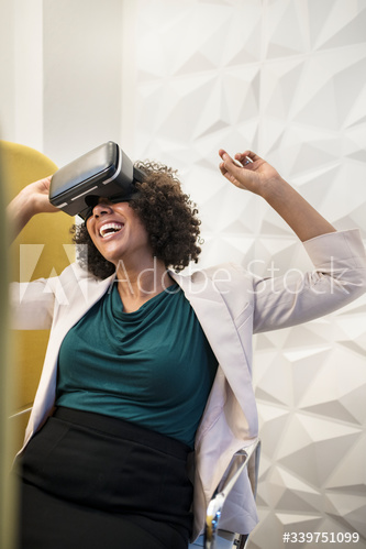 Woman having fun with a VR set