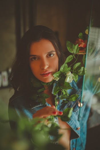 Woman Hiding on Plant