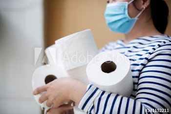 Woman hoarding toilet paper